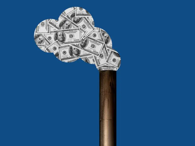 A picture of money coming out of the top of a stick.